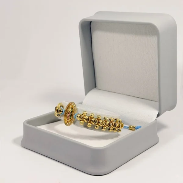 Pulsera Tejida | Virgen de Guadalupe | Oro Laminado 18K | Color Azul Pastel.