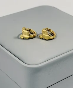 Alternative view of Aretes Huggie Silueta MKM Lisa Dorada | Colección Chiuso | Oro Laminado 18K