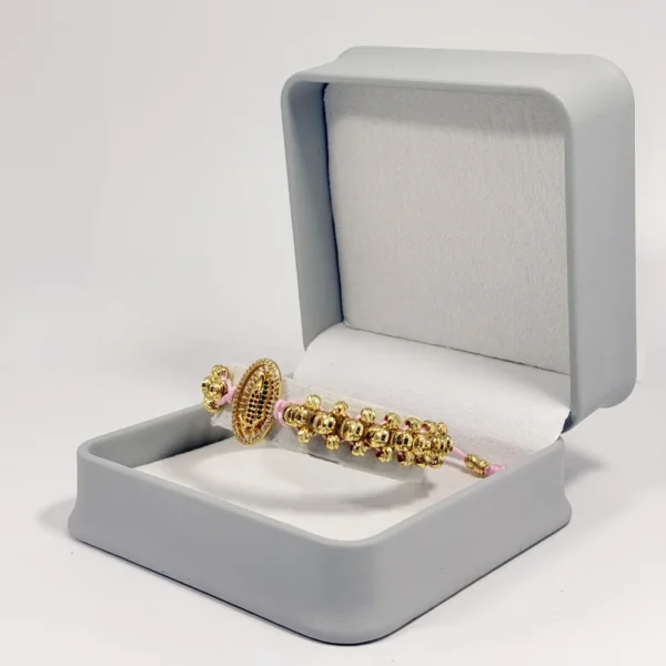 Pulsera Tejida | Virgen de Guadalupe | Oro Laminado 18K | Color Rosado Pastel.